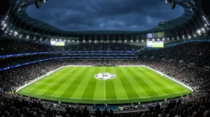 Voetbalstadion verlicht voor een Europese avondwedstrijd met een sterrenpatroon op het veld